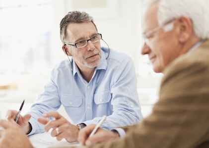 Businessmen talking in meeting